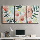 Three-panel canvas wall art featuring layered tropical plant collage, displayed above a desk in a home office.