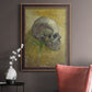 Profile skull study artwork by Vincent van Gogh in an ornate bronzed mahogany wood frame displayed in a neutral interior setting.