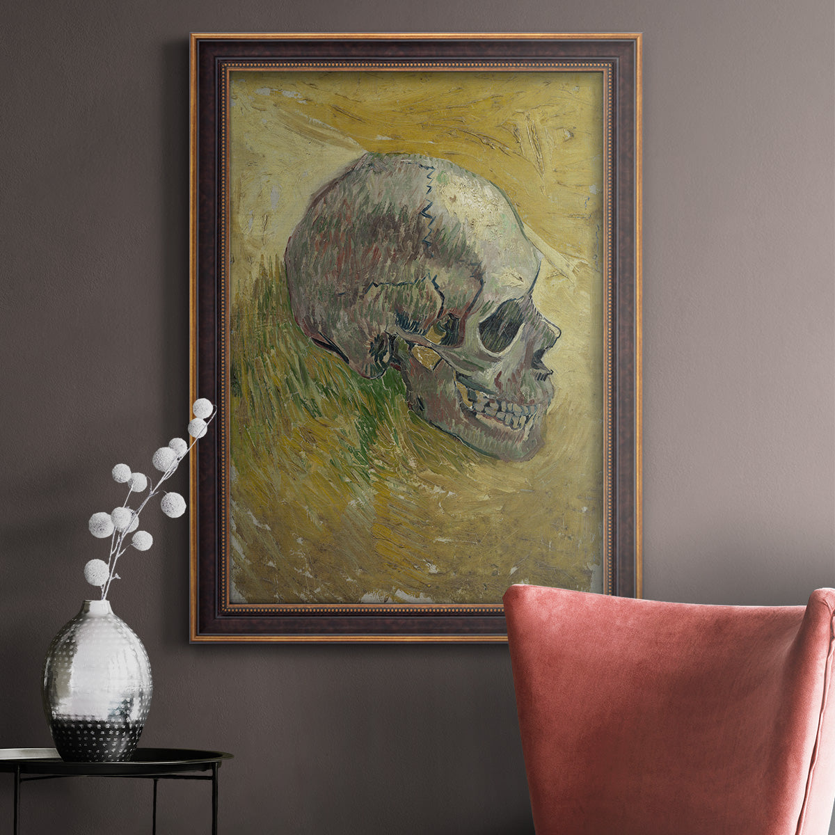 Profile skull study artwork by Vincent van Gogh in an ornate bronzed mahogany wood frame displayed in a neutral interior setting.