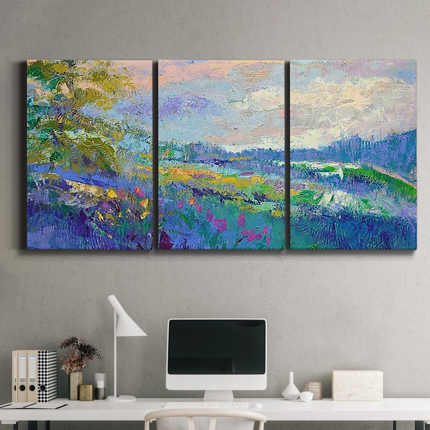Three-panel canvas wall art featuring cheerful landscape under open sky, displayed above a desk in a home office.