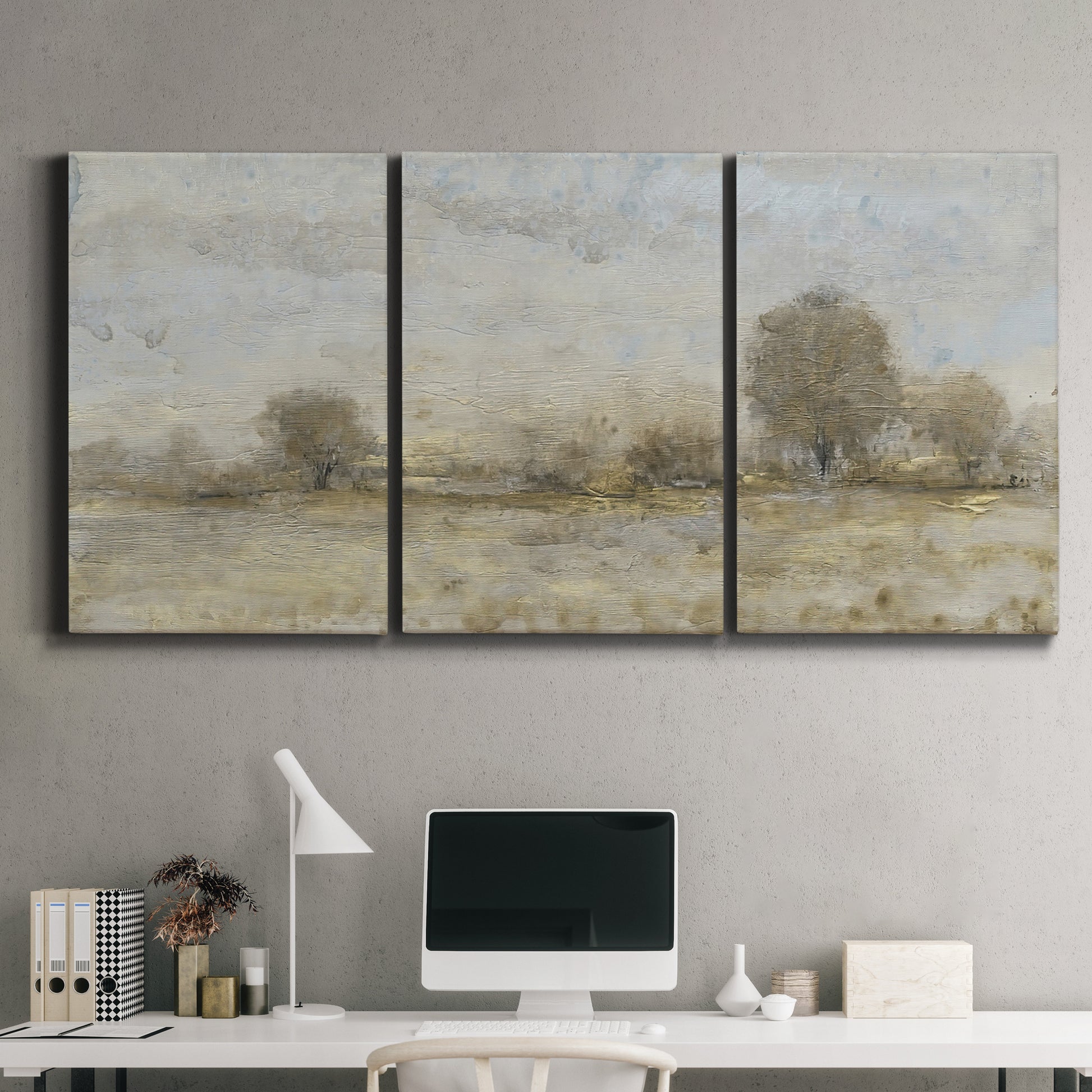 Three-panel canvas wall art featuring late season rural harvest fields, displayed above a desk in a home office.