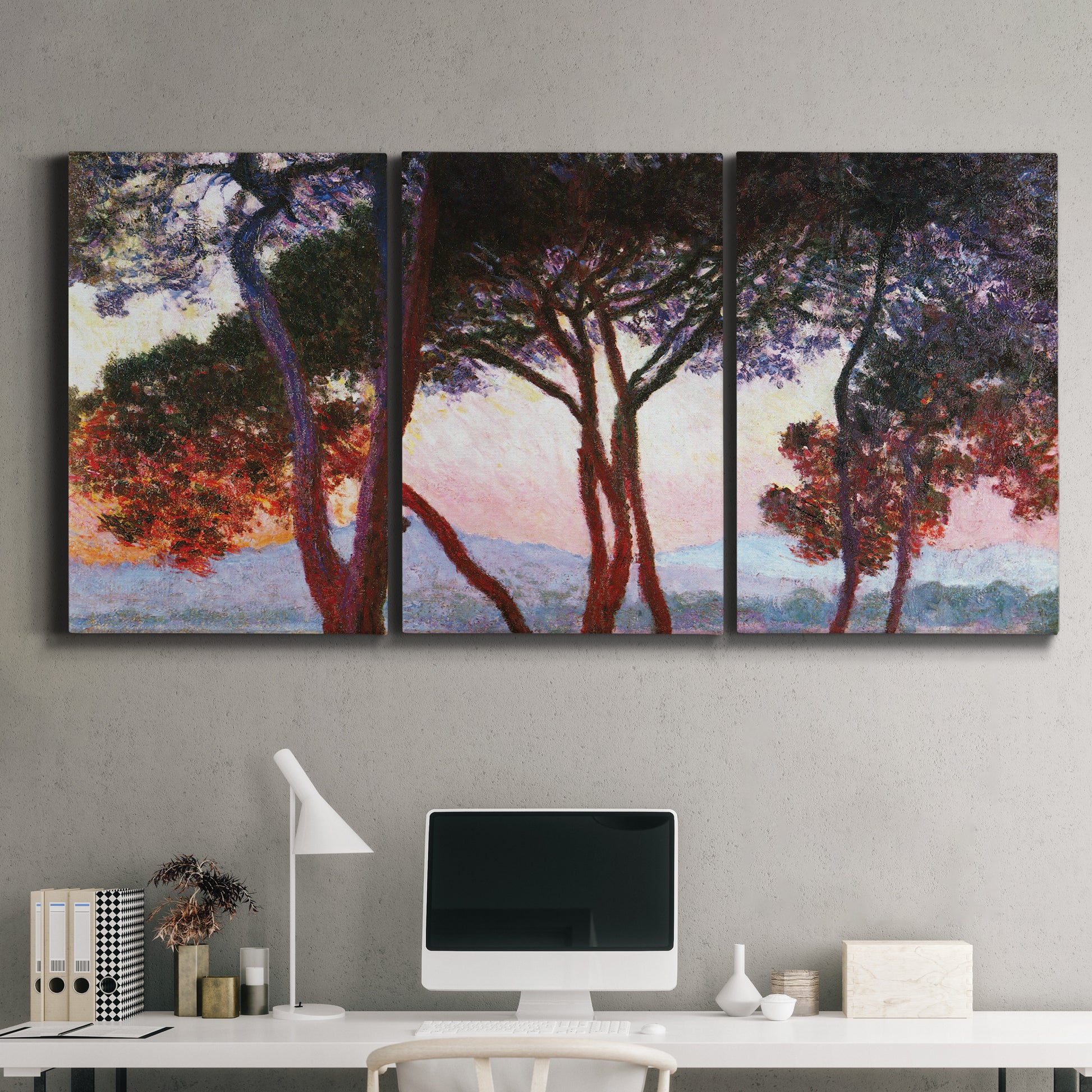 Three-panel canvas wall art featuring sunlit pines along mediterranean coast, displayed above a desk in a home office.