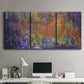 Three-panel canvas wall art featuring abstract rainfall with butterfly forms, displayed above a desk in a home office.