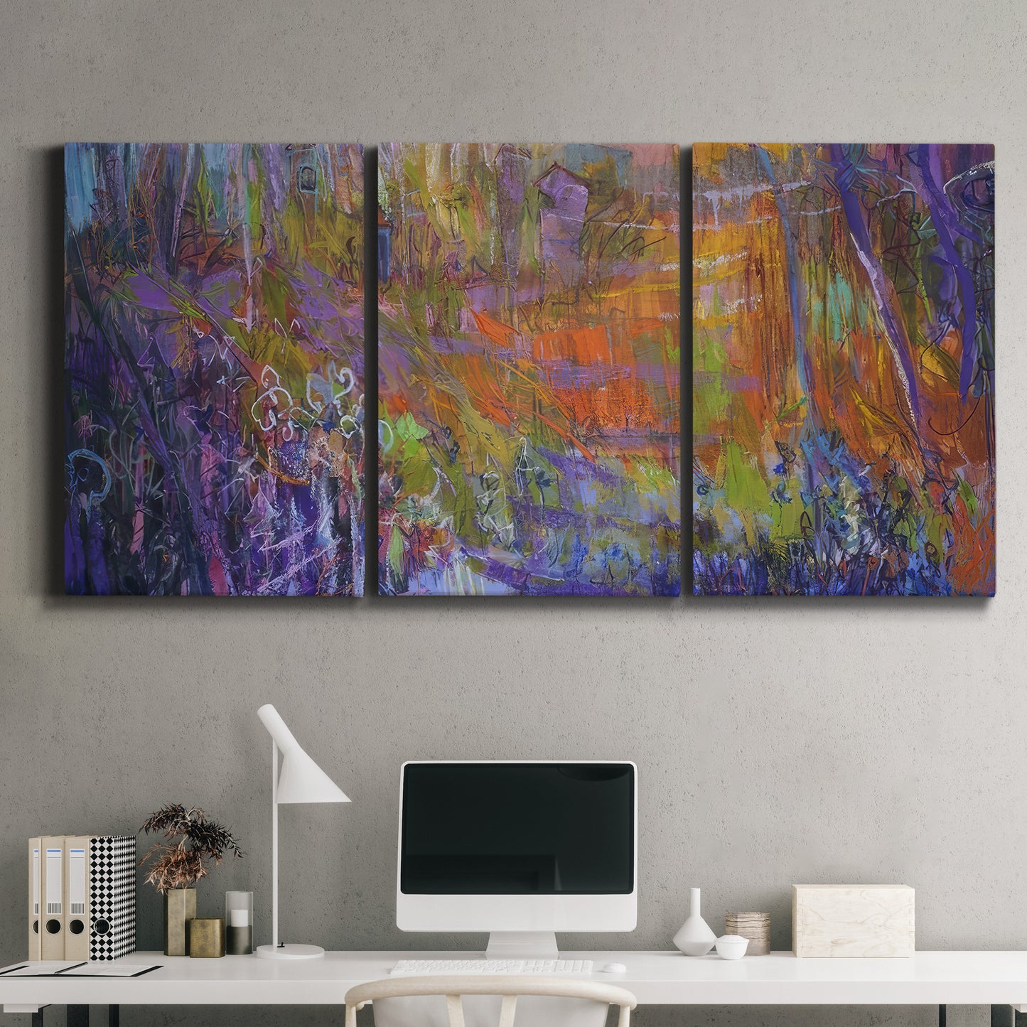 Three-panel canvas wall art featuring abstract rainfall with butterfly forms, displayed above a desk in a home office.