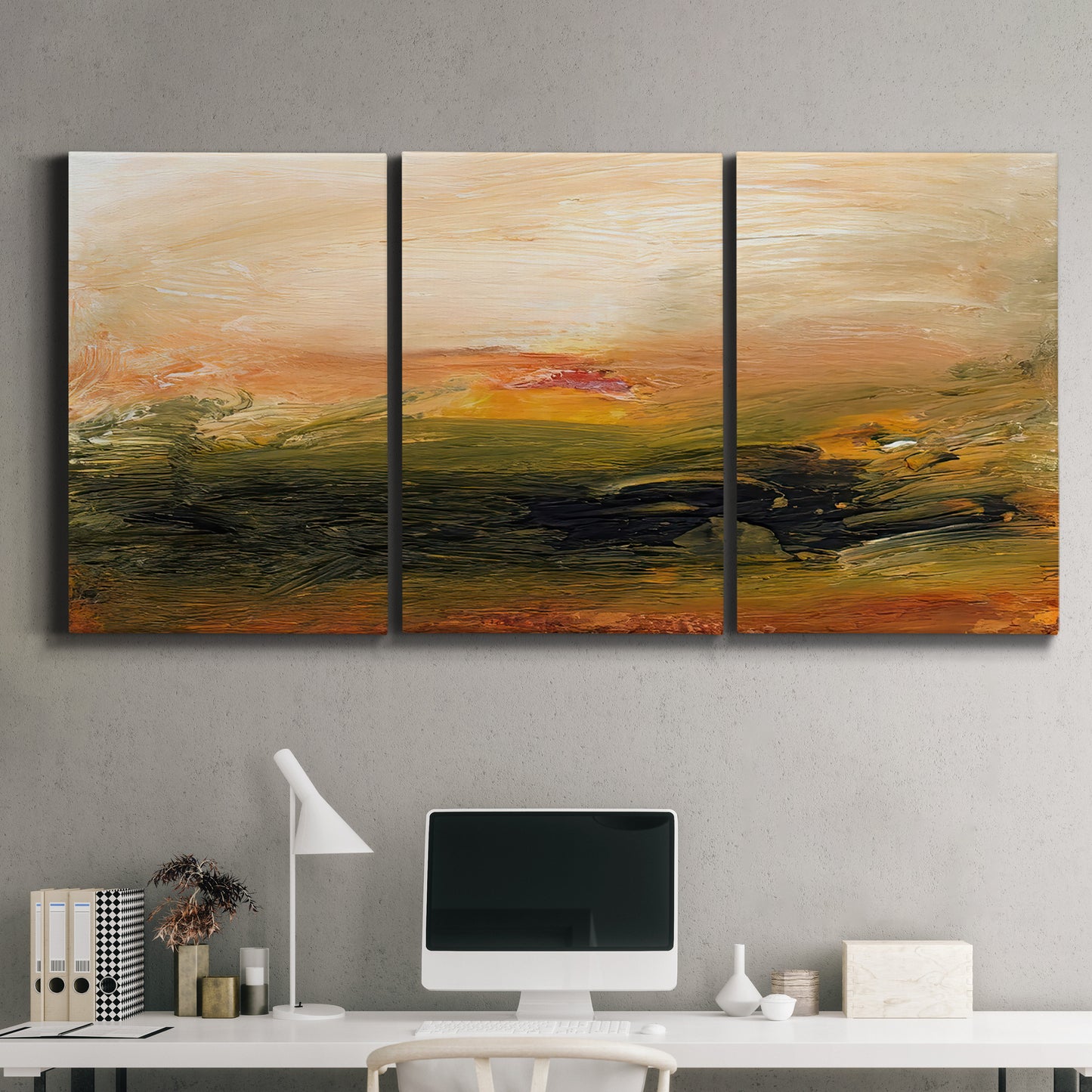 Three-panel canvas wall art featuring soft abstract evening light, displayed above a desk in a home office.