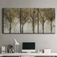 Three-panel canvas wall art featuring sunlight filtering through trees, displayed above a desk in a home office.