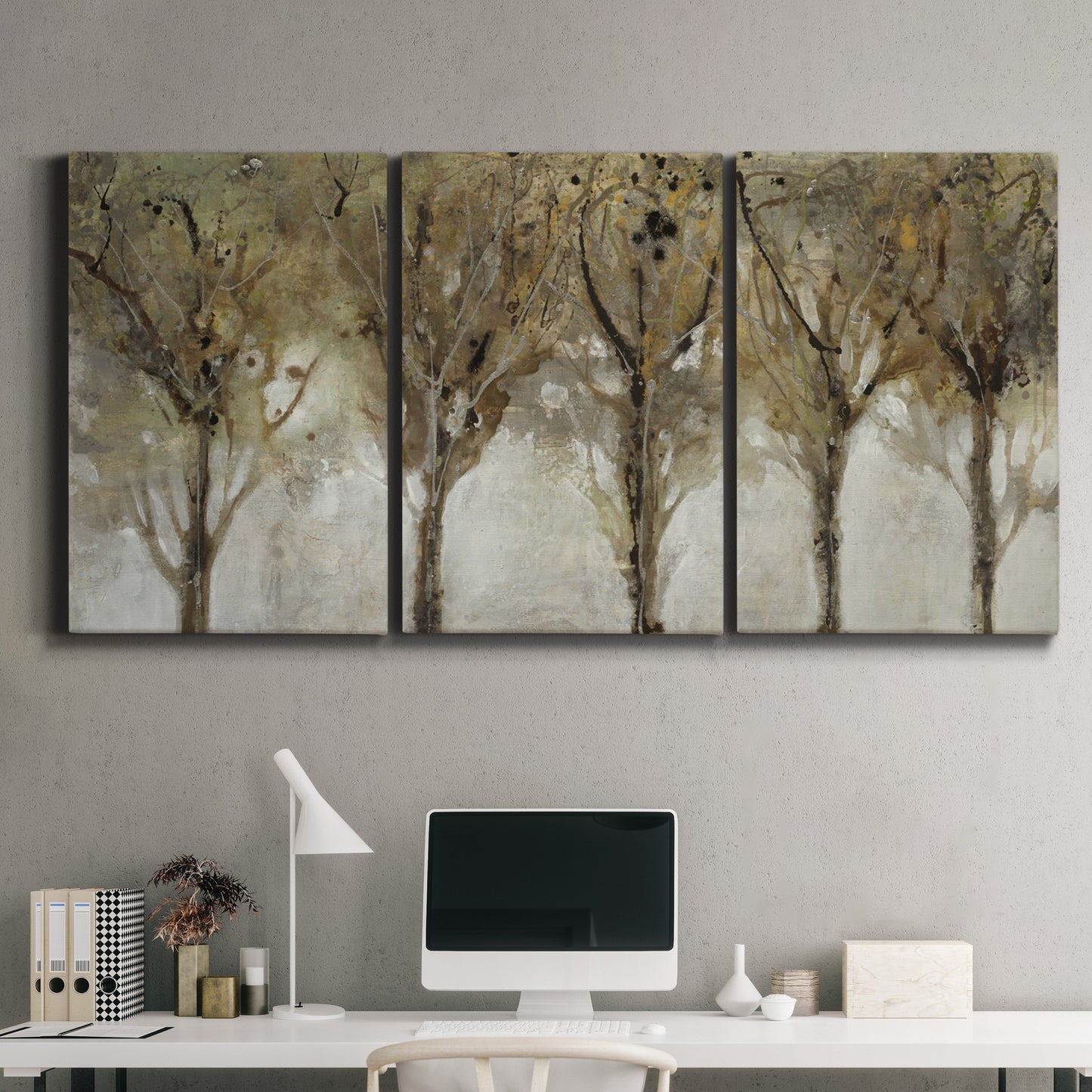 Three-panel canvas wall art featuring sunlight filtering through trees, displayed above a desk in a home office.