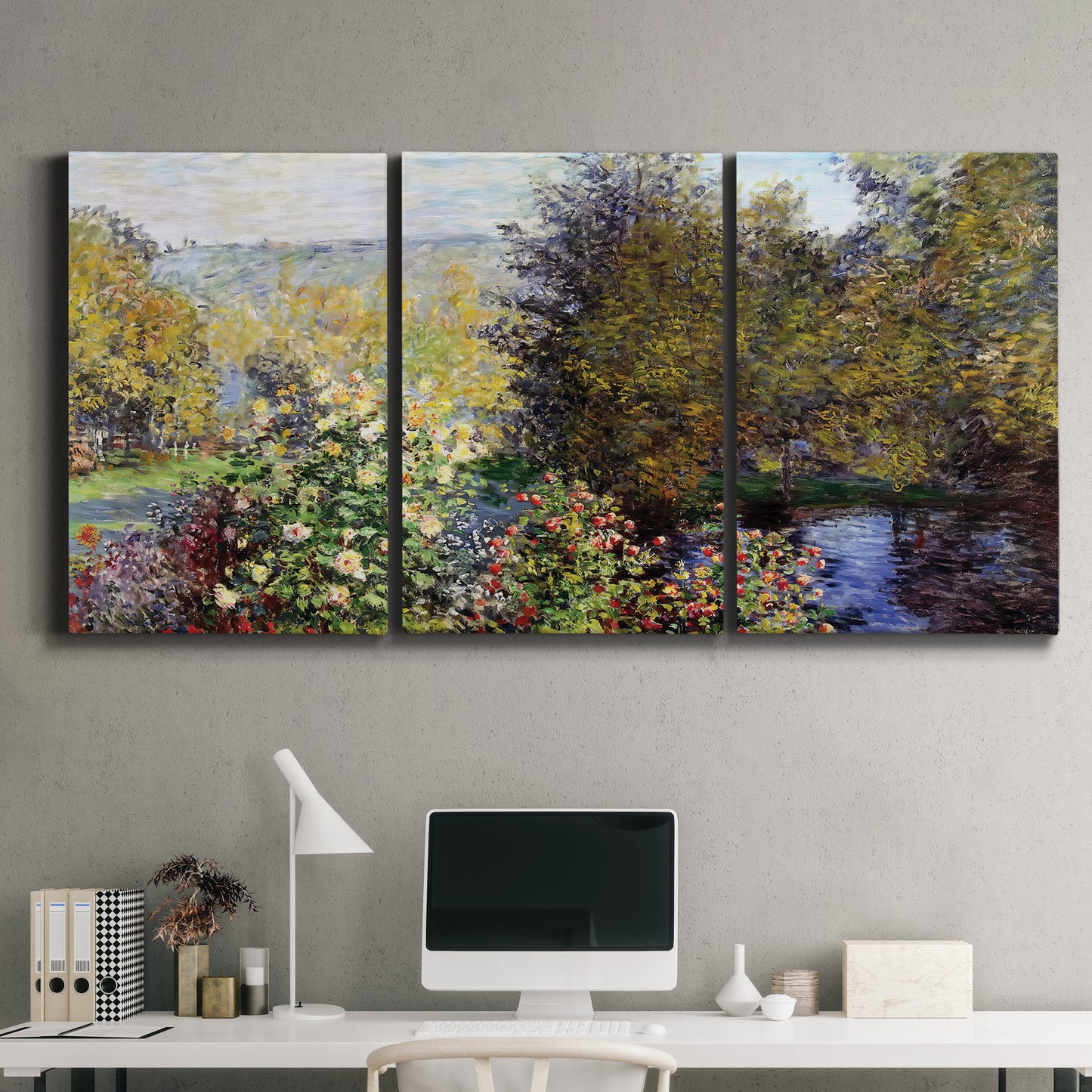 Three-panel canvas wall art featuring garden corner with flowering trees, displayed above a desk in a home office.