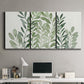 Three-panel canvas wall art featuring foraged leafy greens botanical study, displayed above a desk in a home office.