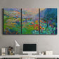 Three-panel canvas wall art featuring embracing landscape with warm tones, displayed above a desk in a home office.
