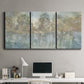 Three-panel canvas wall art featuring abstract river reflections, displayed above a desk in a home office.