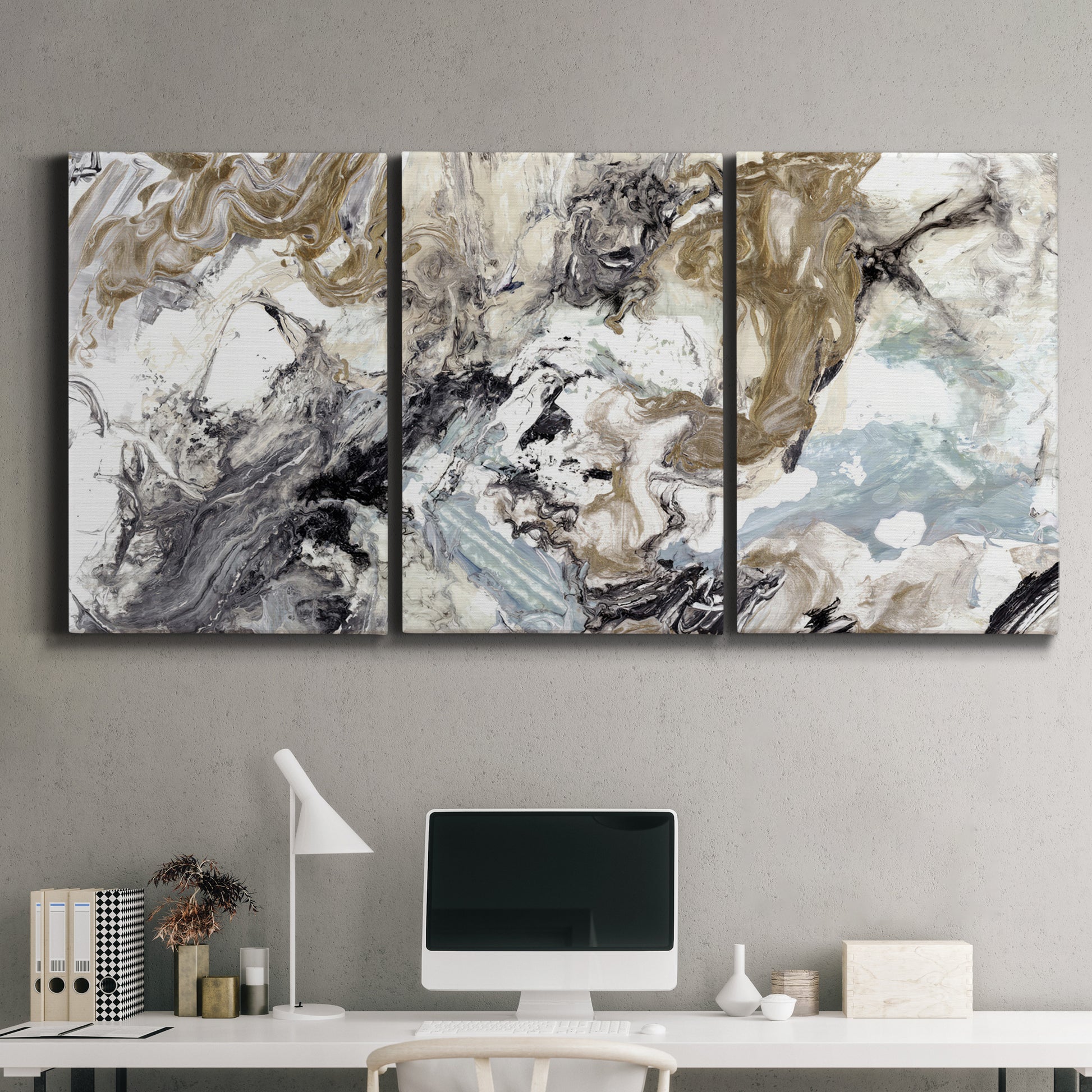 Three-panel canvas wall art featuring marbled modern abstract textures, displayed above a desk in a home office.