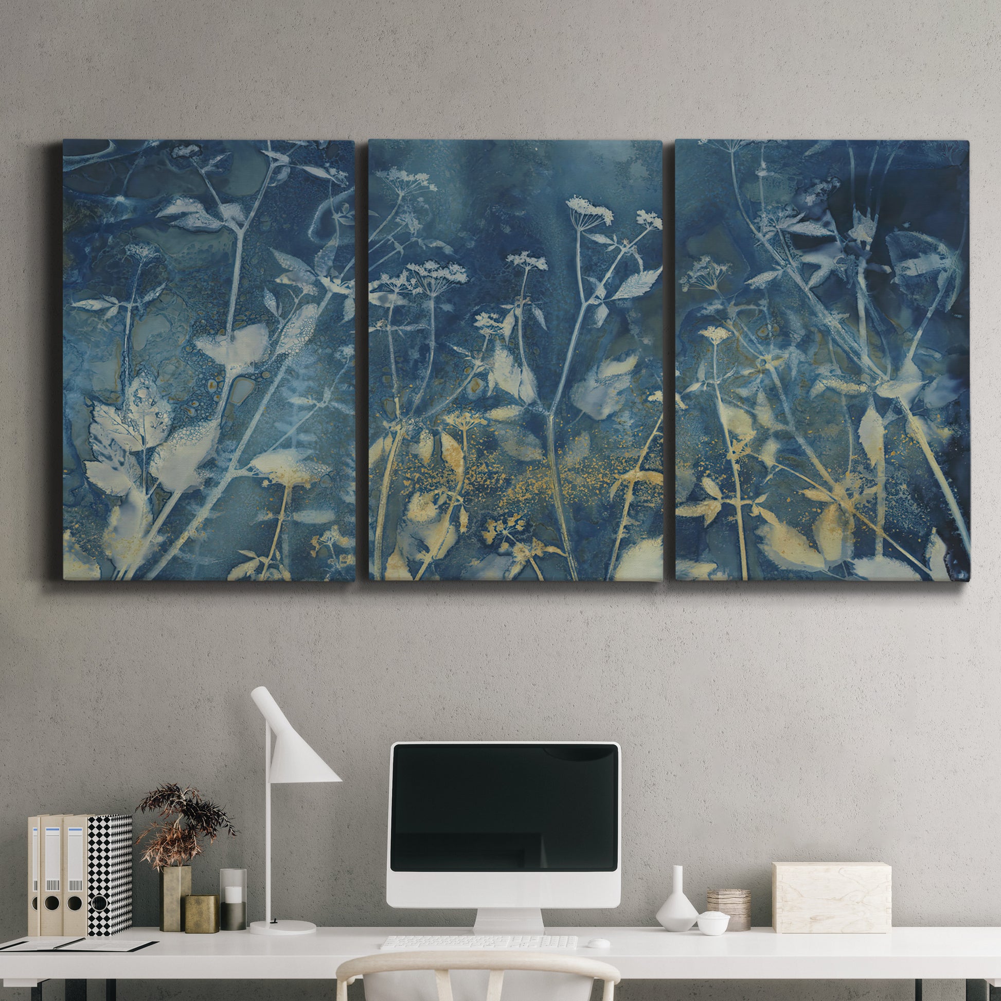 Three-panel canvas wall art featuring dark abstract with rich tonal depth, displayed above a desk in a home office.