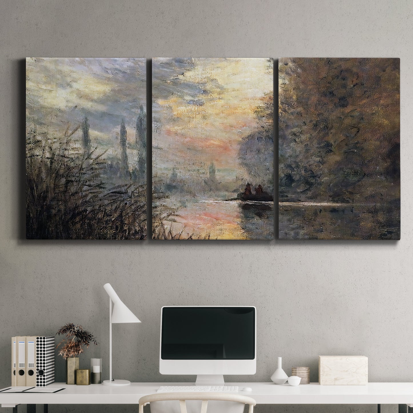 Three-panel canvas wall art featuring winter river sunset with reflections, displayed above a desk in a home office.