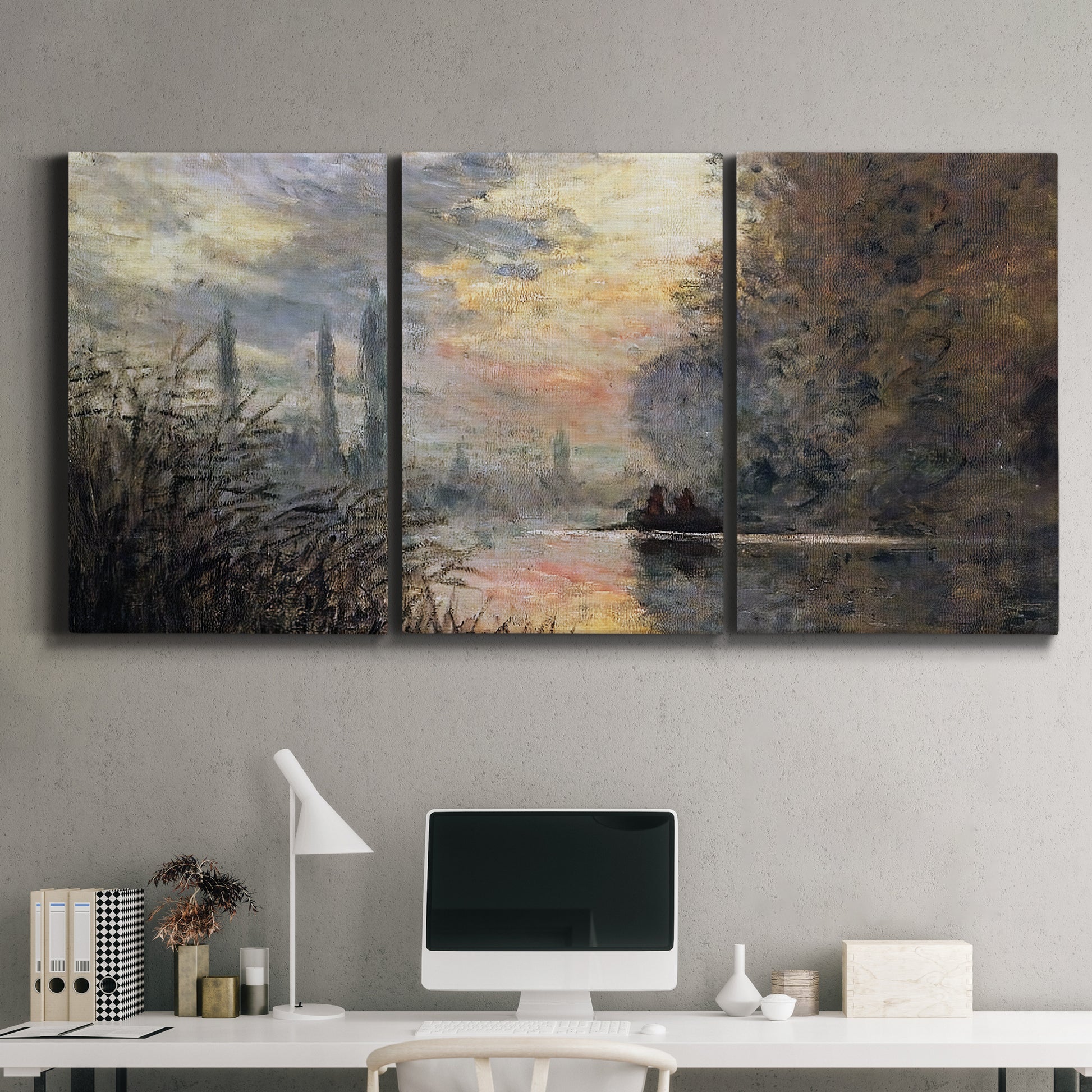 Three-panel canvas wall art featuring winter river sunset with reflections, displayed above a desk in a home office.