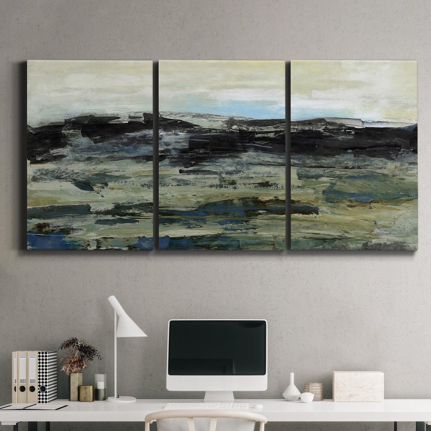 Three-panel canvas wall art featuring muted abstract landscape study, displayed above a desk in a home office.