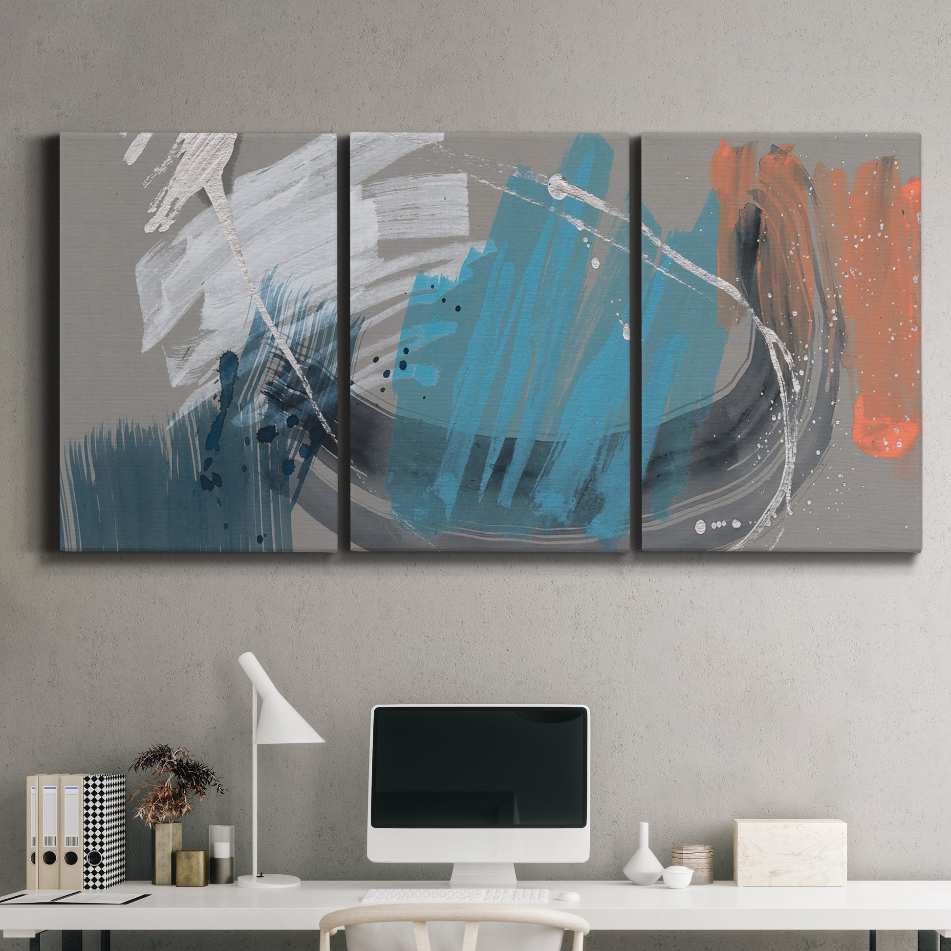 Three-panel canvas wall art featuring playful abstract mark making, displayed above a desk in a home office.
