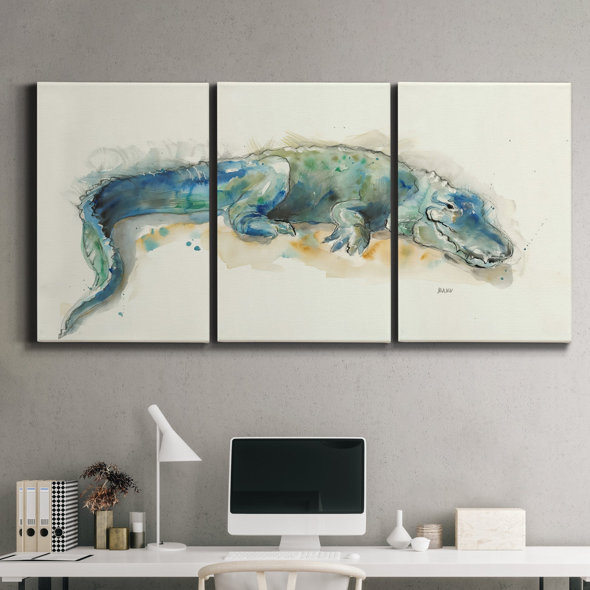 Three-panel canvas wall art featuring alligator illustrated wildlife portrait, displayed above a desk in a home office.
