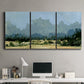 Three-panel canvas wall art featuring rural farmland landscape in watercolor, displayed above a desk in a home office.