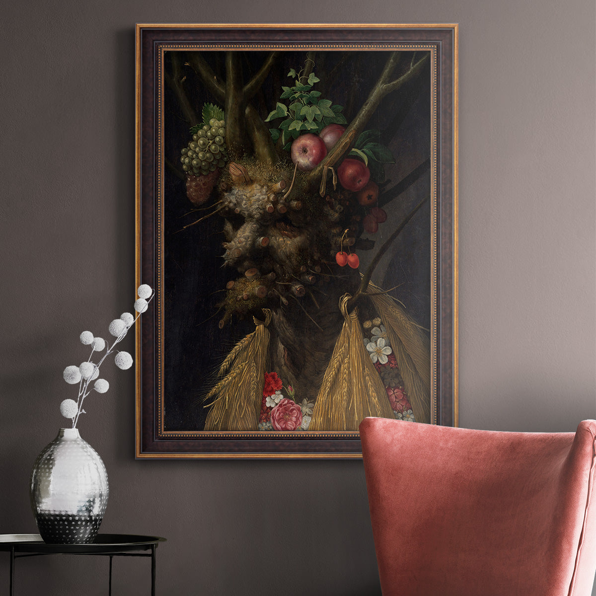 Surreal allegorical portrait representing the four seasons by Giuseppe Arcimboldo in an ornate bronzed mahogany wood frame displayed in a neutral interior setting.
