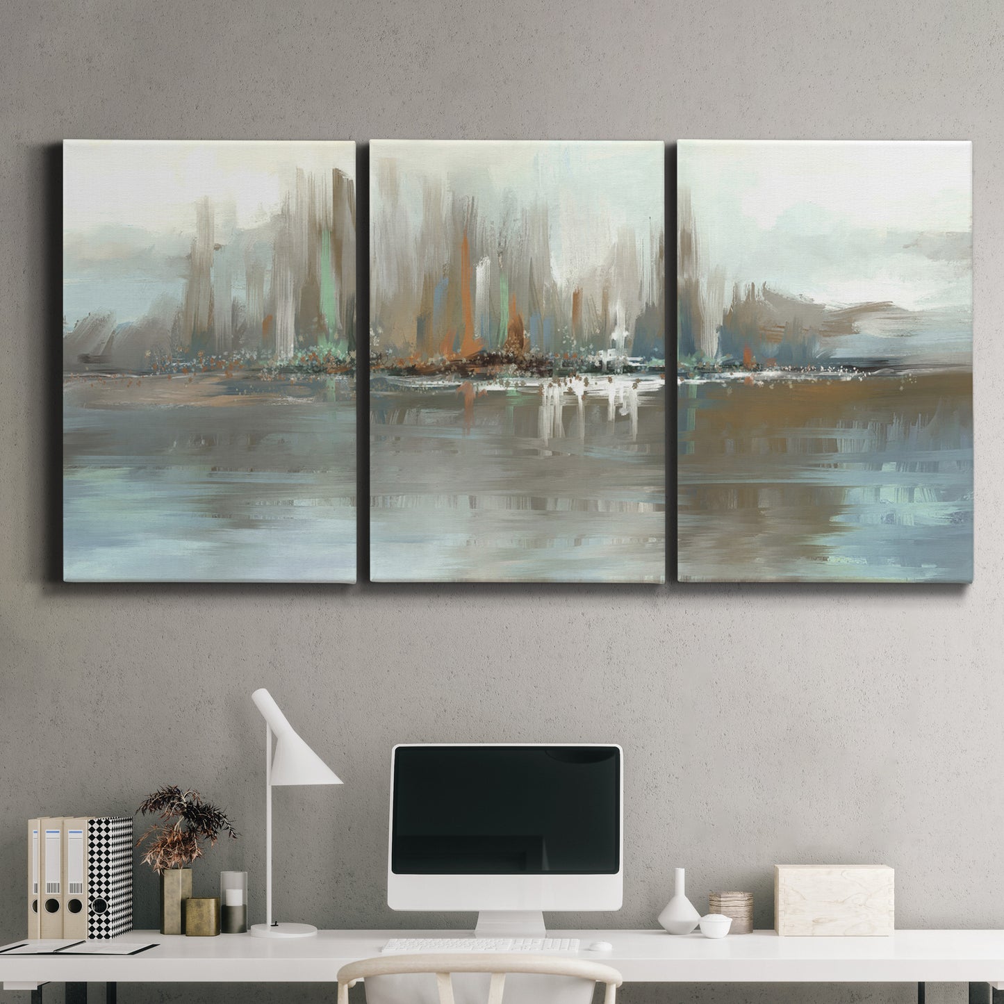 Three-panel canvas wall art featuring glowing abstract city lights, displayed above a desk in a home office.