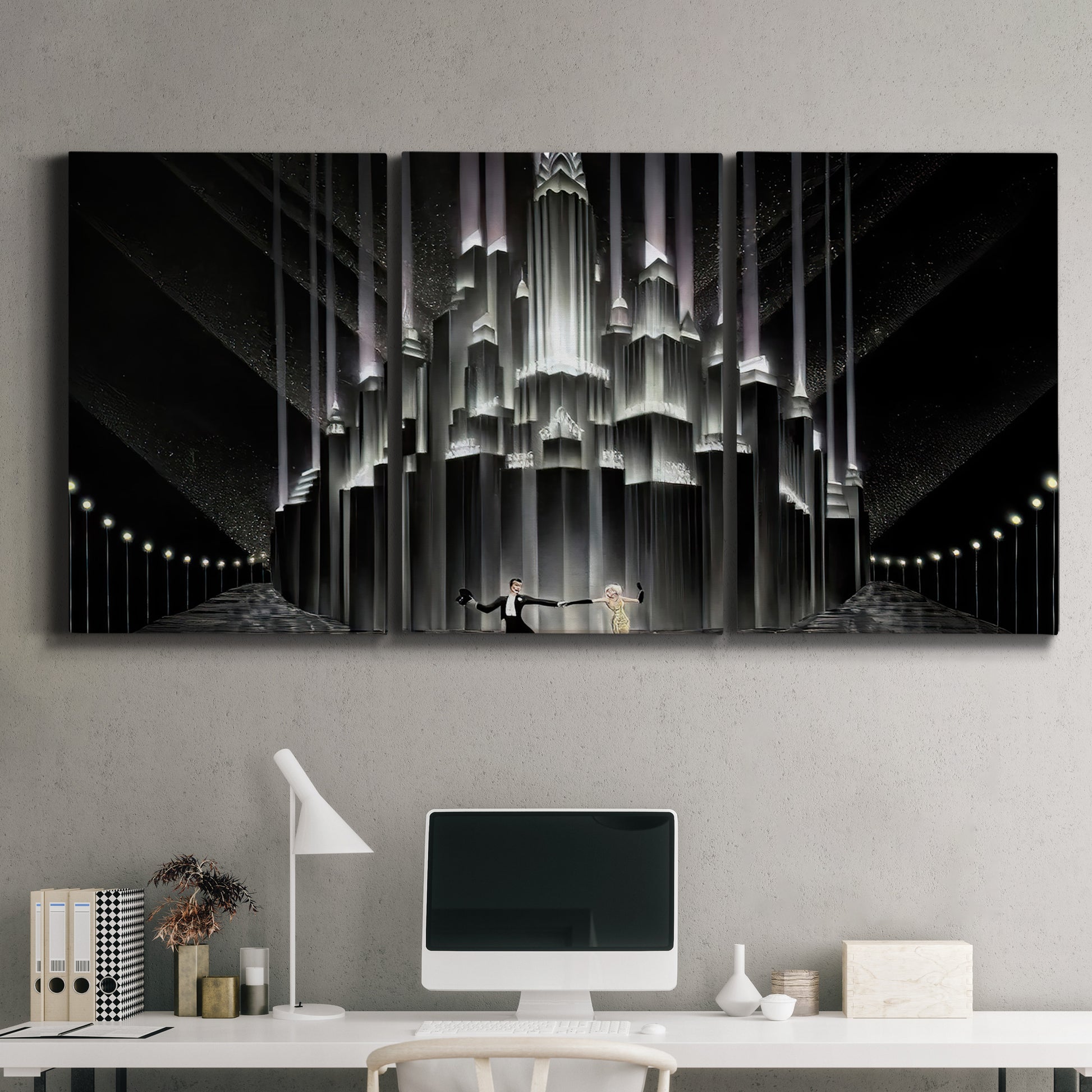 Three-panel canvas wall art featuring vintage city scene with figures, displayed above a desk in a home office.