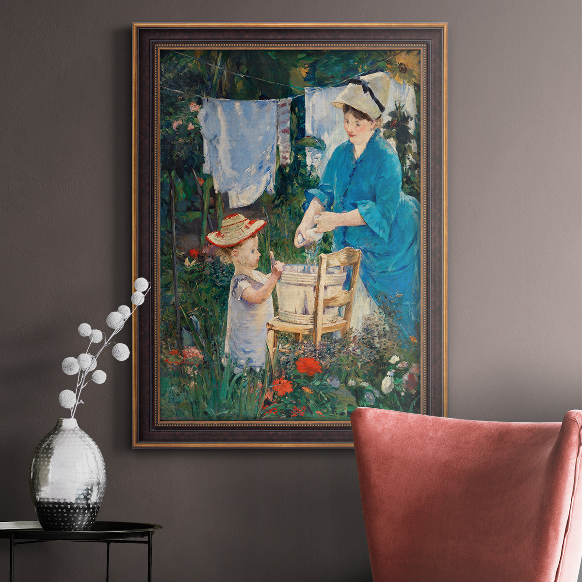 Intimate domestic genre scene by Édouard Manet in an ornate bronzed mahogany wood frame displayed in a neutral interior setting.