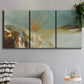Three-panel canvas wall art featuring earth toned abstract solar landscape, displayed in a modern living room above a sofa.