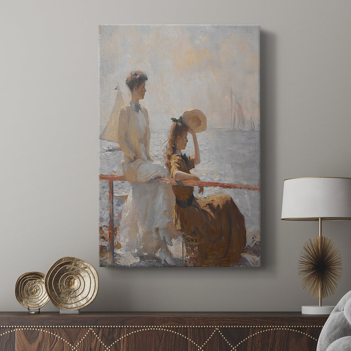 Canvas art print featuring a luminous scene with figures and ocean backdrop displayed in a modern interior space.