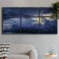 Three-panel canvas wall art featuring hot air balloons rising at dawn, displayed in a modern living room above a sofa.