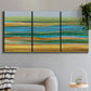 Three-panel canvas wall art featuring parallel linear abstract striations, displayed in a modern living room above a sofa.