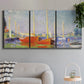 Three-panel canvas wall art featuring red boats along riverbank, displayed in a modern living room above a sofa.