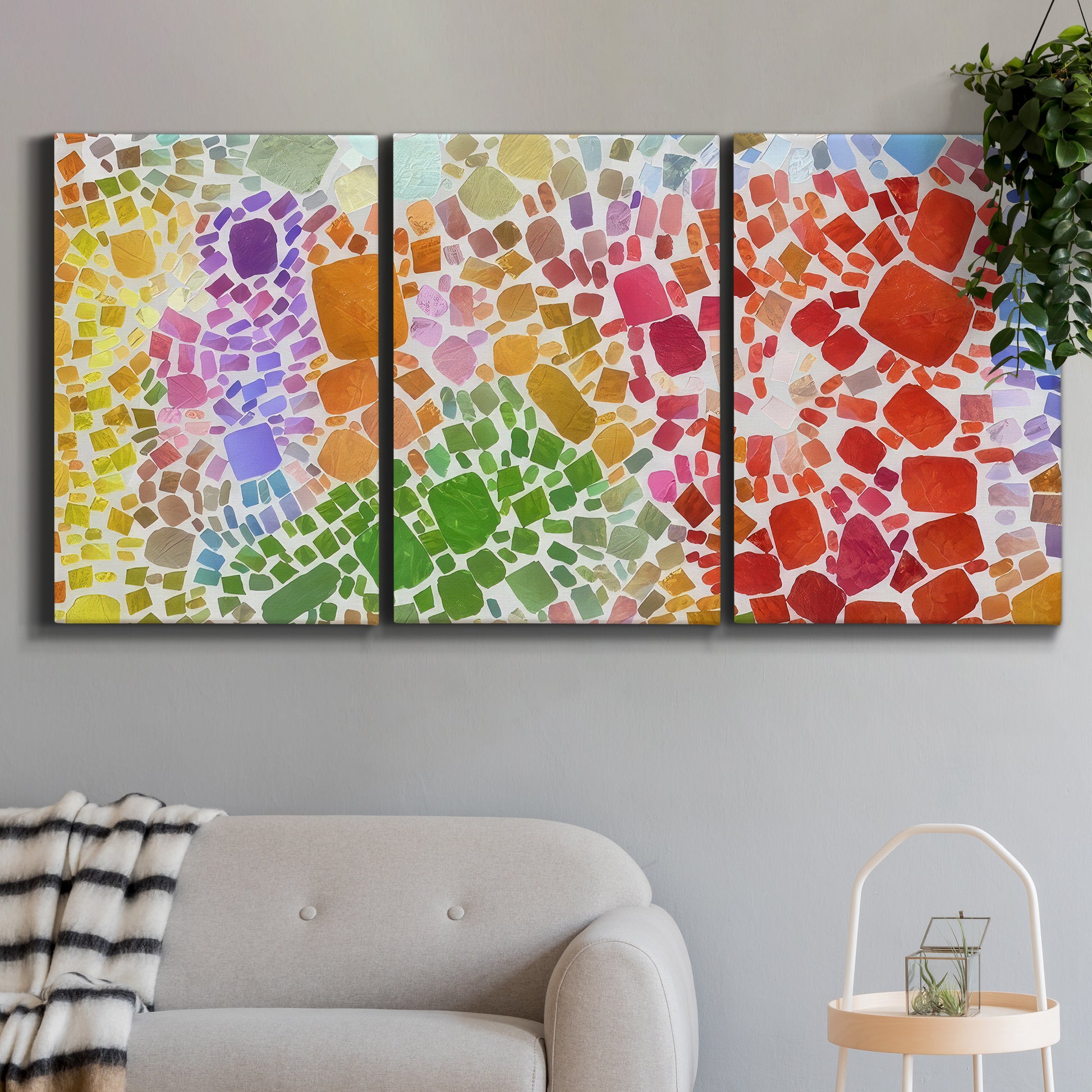 Three-panel canvas wall art featuring peaceful tropical inspired landscape, displayed in a modern living room above a sofa.