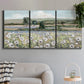 Three-panel canvas wall art featuring vintage poppy filled valley, displayed in a modern living room above a sofa.