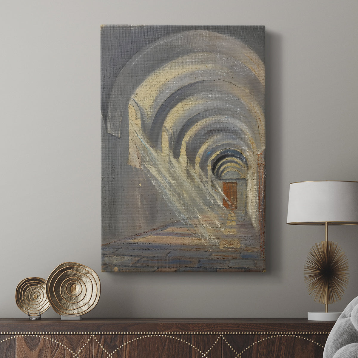 Canvas art print featuring a geometric space with slanting beams of sunlight displayed in a modern interior space.