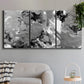 Three-panel canvas wall art featuring abstract marble texture composition, displayed in a modern living room above a sofa.
