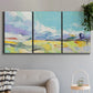 Three-panel canvas wall art featuring open landscape suggesting distant journey, displayed in a modern living room above a sofa.