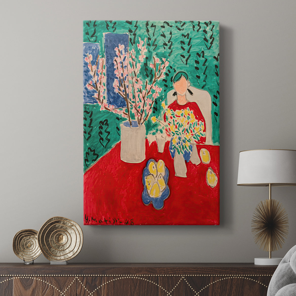 Canvas art print featuring a decorative arrangement with blossoms and flat color displayed in a modern interior space.