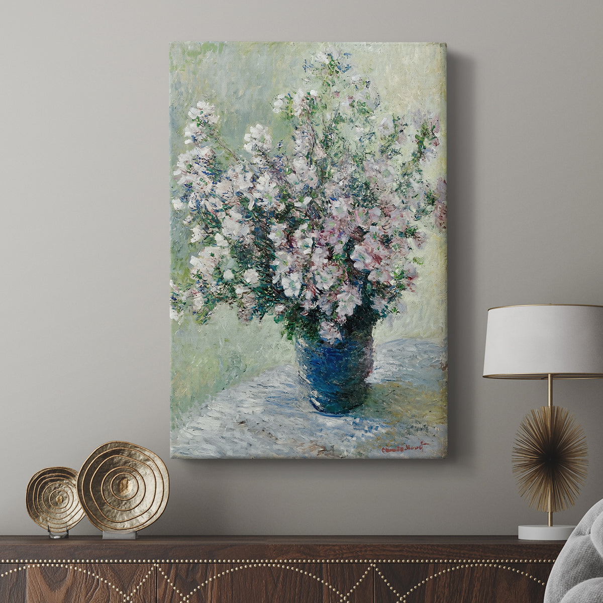 Canvas art print featuring a bouquet with layered petals and soft light displayed in a modern interior space.