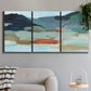 Three-panel canvas wall art featuring vibrant abstract with dramatic motion, displayed in a modern living room above a sofa.