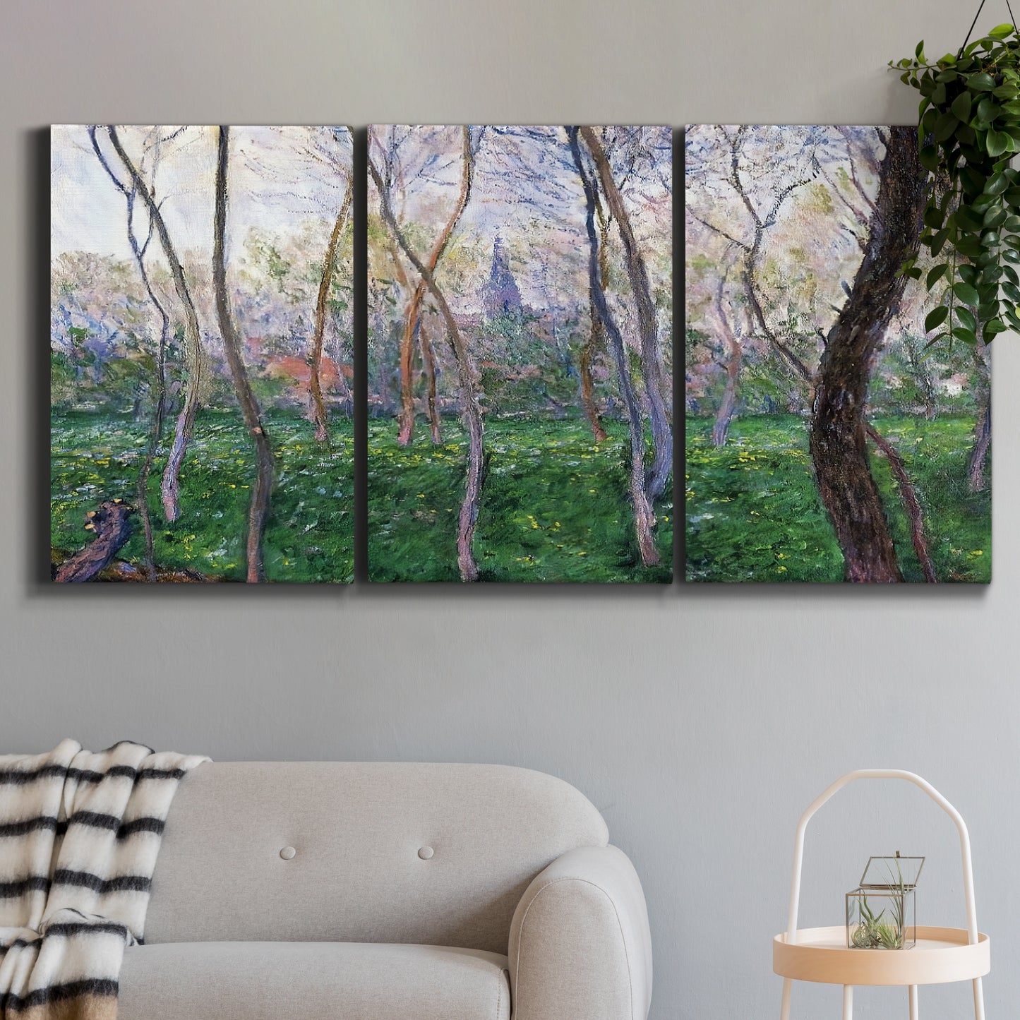 Three-panel canvas wall art featuring spring landscape along river, displayed in a modern living room above a sofa.