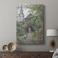 Canvas art print featuring a calm street view with classic European architecture displayed in a modern interior space.