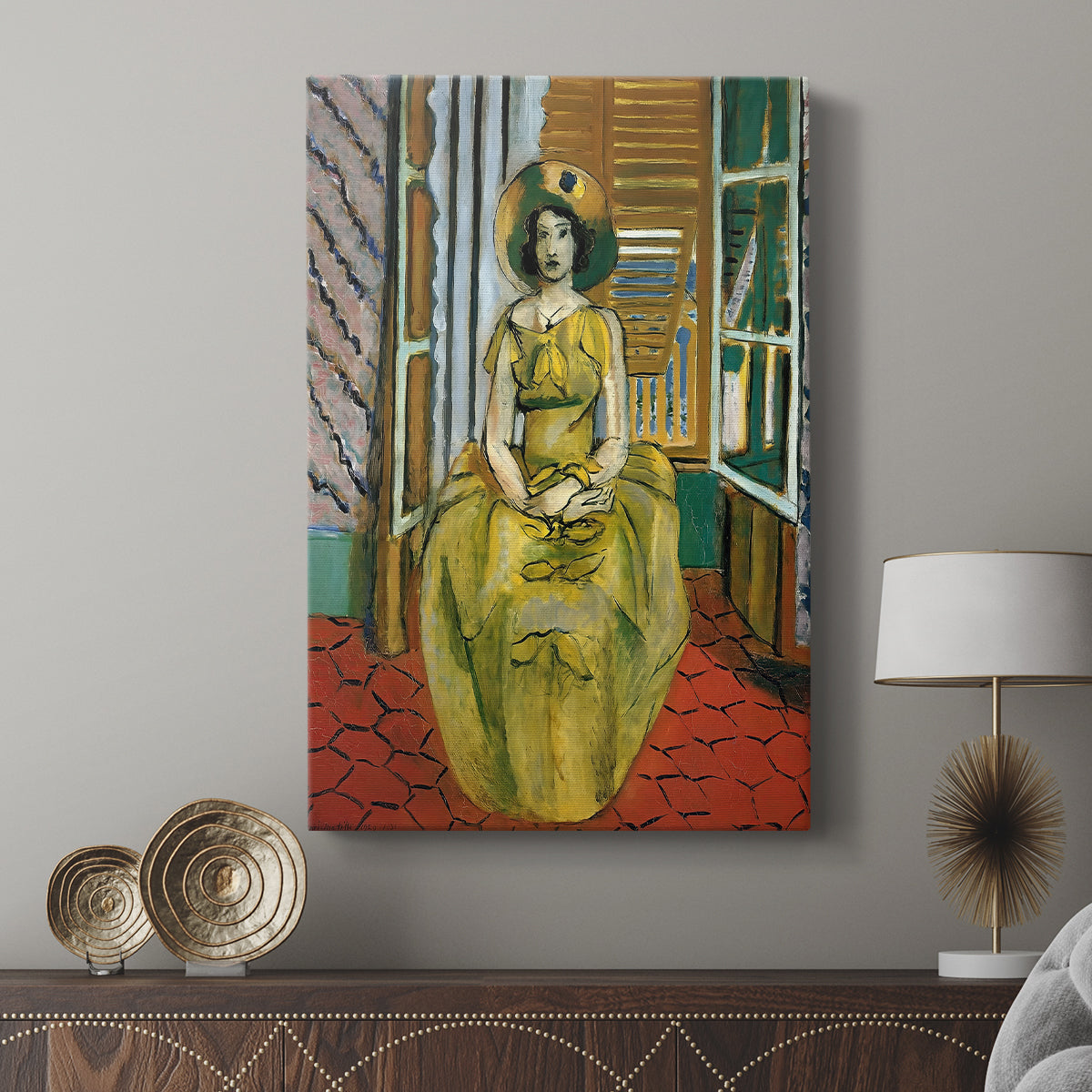 Canvas art print featuring a vivid composition with strong yellow accents and flat color displayed in a modern interior space.