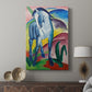 Canvas art print featuring a vibrant composition with a horse and flowing shapes displayed in a modern interior space.