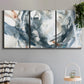 Three-panel canvas wall art featuring repeating abstract geometric array, displayed in a modern living room above a sofa.