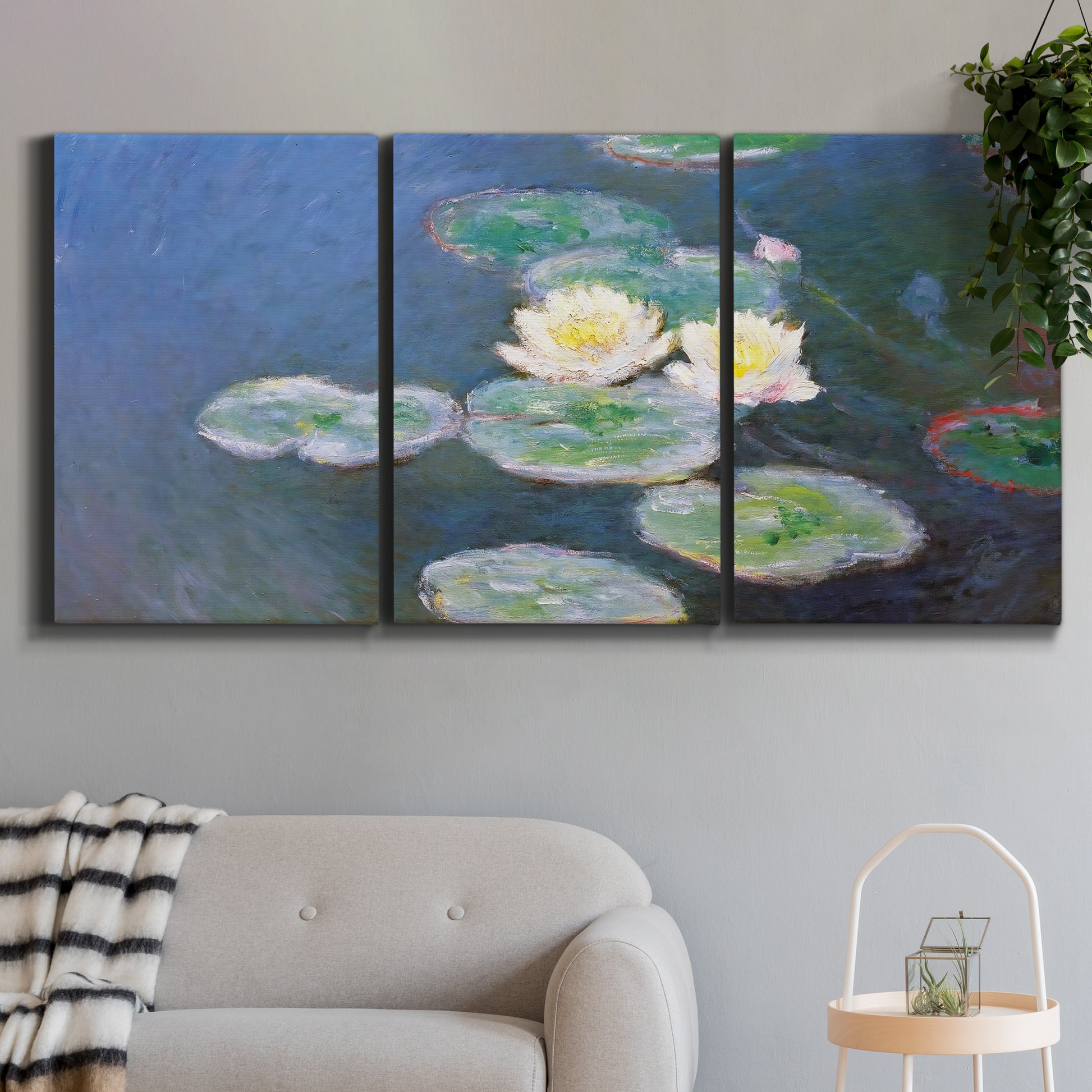 Three-panel canvas wall art featuring water lilies floating on pond, displayed in a modern living room above a sofa.