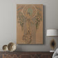 Canvas art print featuring a decorative print with intricate borders and soft tones displayed in a modern interior space.