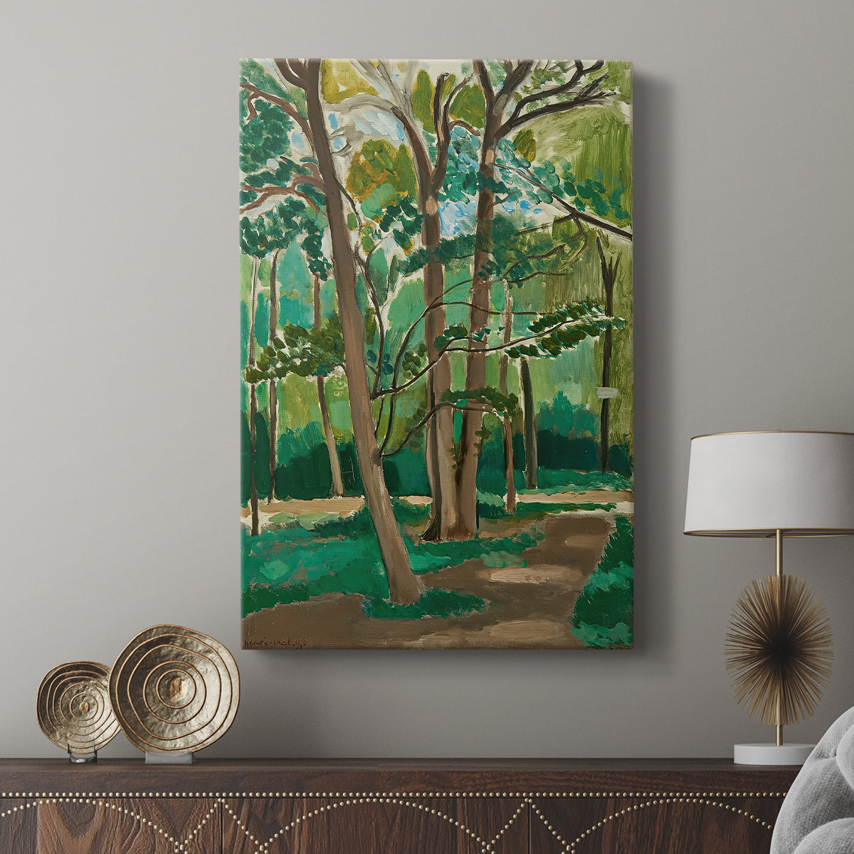 Canvas art print featuring a vibrant landscape with trees and intersecting paths displayed in a modern interior space.