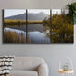 Three-panel canvas wall art featuring low light river photography, displayed in a modern living room above a sofa.