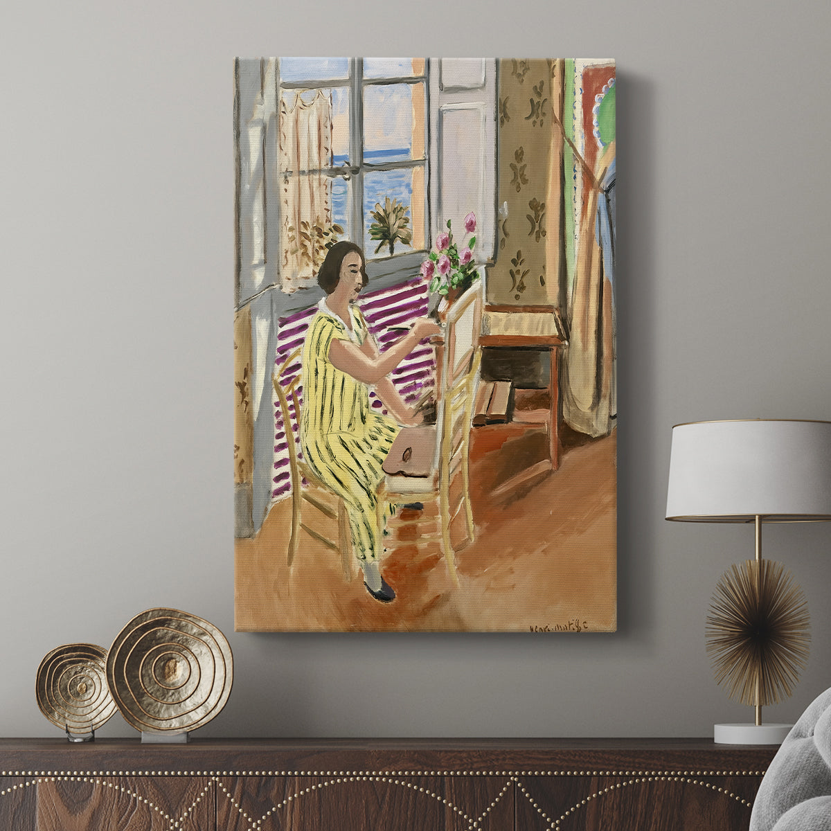 Canvas art print featuring a lively composition with a painter and decorative surroundings displayed in a modern interior space.